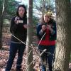 Marcy (Ashley Wray) and Christi (Kelsey Kaufmann) search the woods in CAMP BLOOD FIRST SLAUGHTER from Polonia Brothers / Sterling Entertainment.