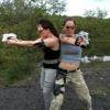 Marie DeLorenzo and Danielle Donahue strike a pose as resistance fighters in a promotional photo for the indie Sci-Fi action movie ROBOWAR from Polonia Brothers / Sterling Entertainment.