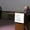 Radio personality Joe Condon introduces filmmaker Bruce G. Hallenbeck at The 2005 Dead Of Winter Free Film Festival at The New York State Museum, Albany, NY. The festival was held on January 22-23 & 29-30, 2005.