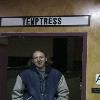 Director Jeff Kirkendall standing in front of the indoor marquee at the Upstate New York Area Premiere of the THE TEMPTRESS from Very Scary Productions, Off-Broadway Theatre & Grille, January 30th, 2003. 